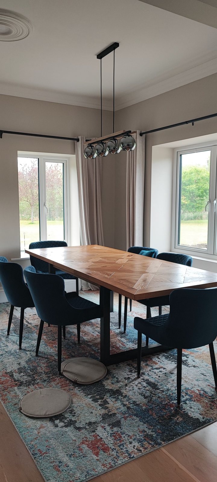 A pendant light over a dining table